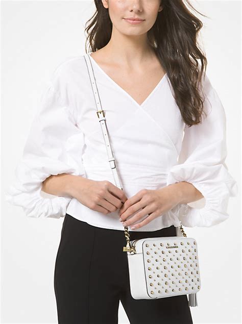 michael kors ginny medium studded pebbled leather crossbody bag|Ginny Medium Studded Pebbled Leather Crossbody Bag.